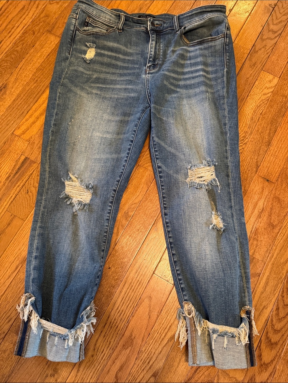 Judy Blue Distressed Boyfriend Jeans in Washed Blue with Frayed Cuffs